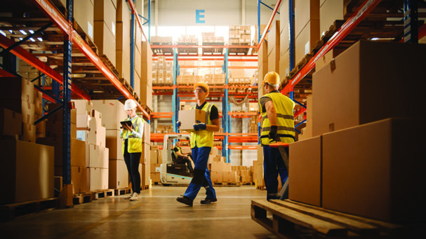 TW1023_workers in warehouse.jpg