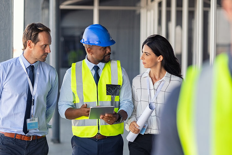 PE0624_design team at construction site.jpg