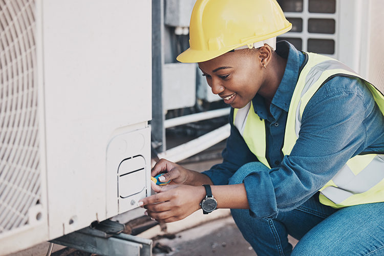 PHCN0724_female HVAC install technician.jpg