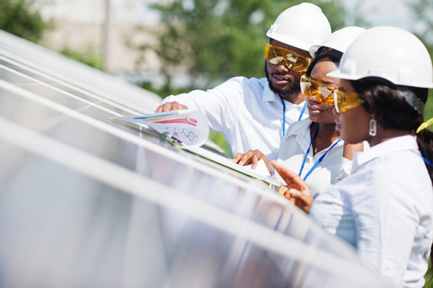 PHCN1224_technicians working on solar panels.jpg